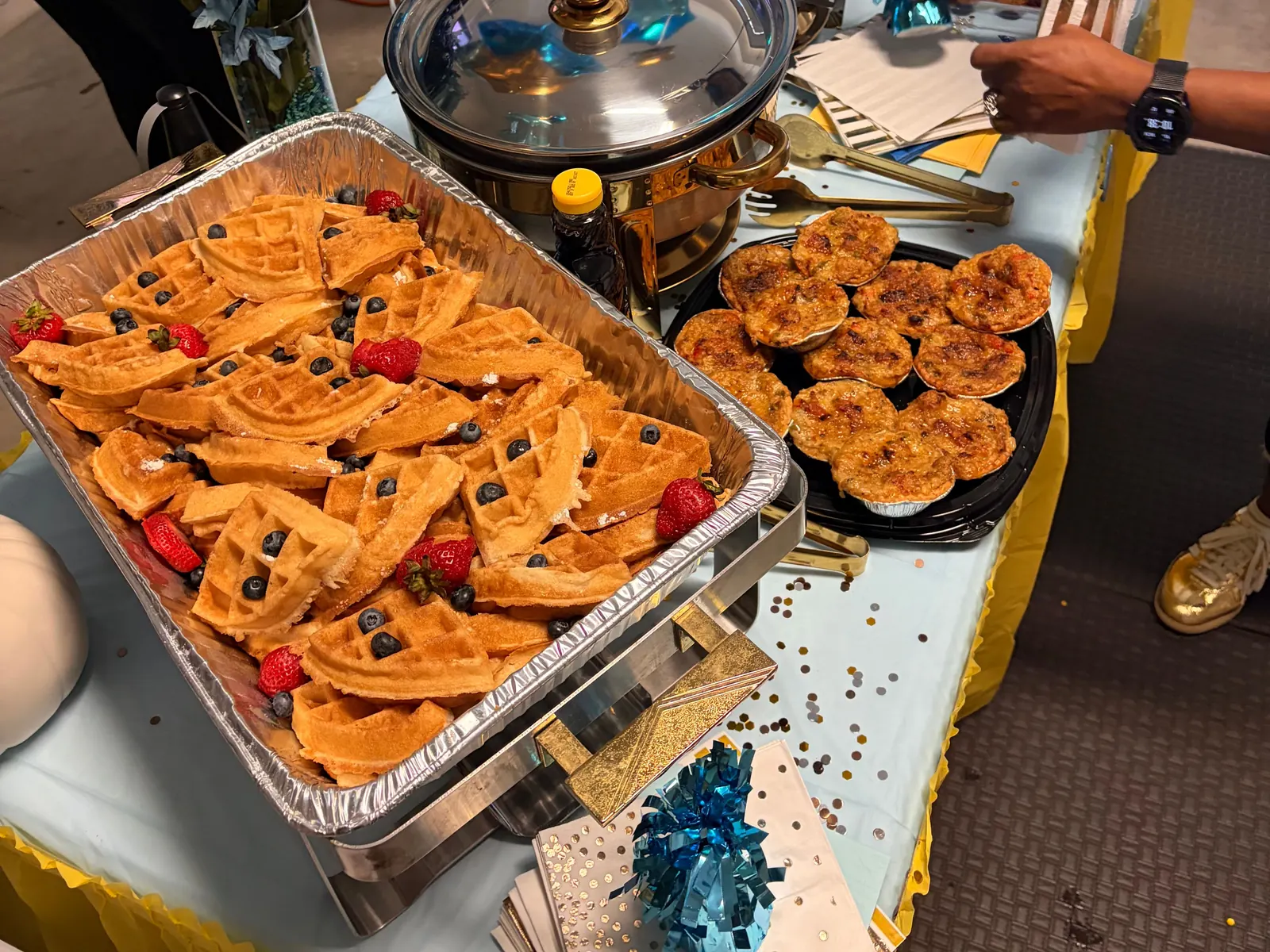 A catering tray of waffles with fresh berries from Bayou Fork Kitchen